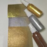 Three color spray